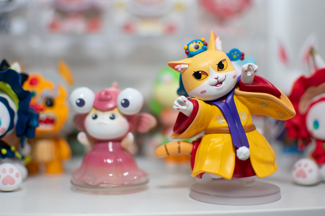 yellow haired girl in blue and yellow dress figurine,