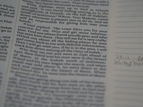 A close-up view of a printed page from a book, displaying text in two columns. On the right, there is a lined section with some handwritten notes. The text is in English and appears to be from a religious or historical book.