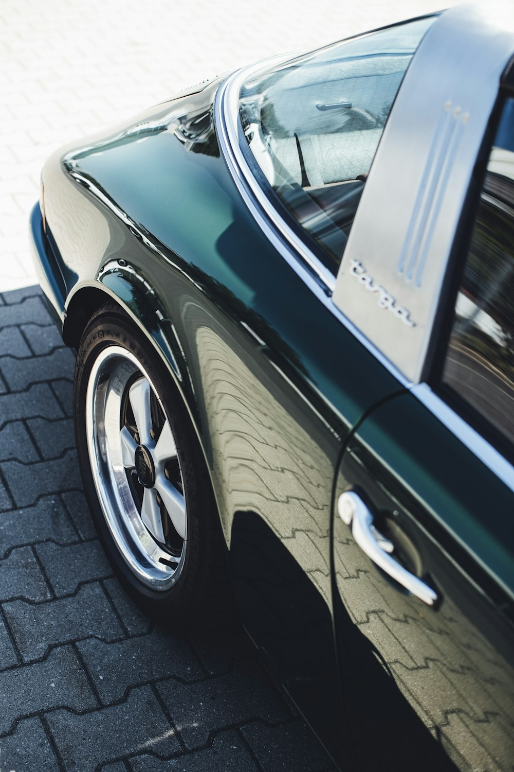 black car on gray concrete floor