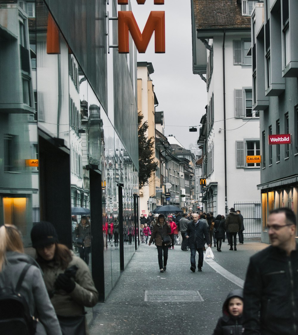 people walking on street during daytime