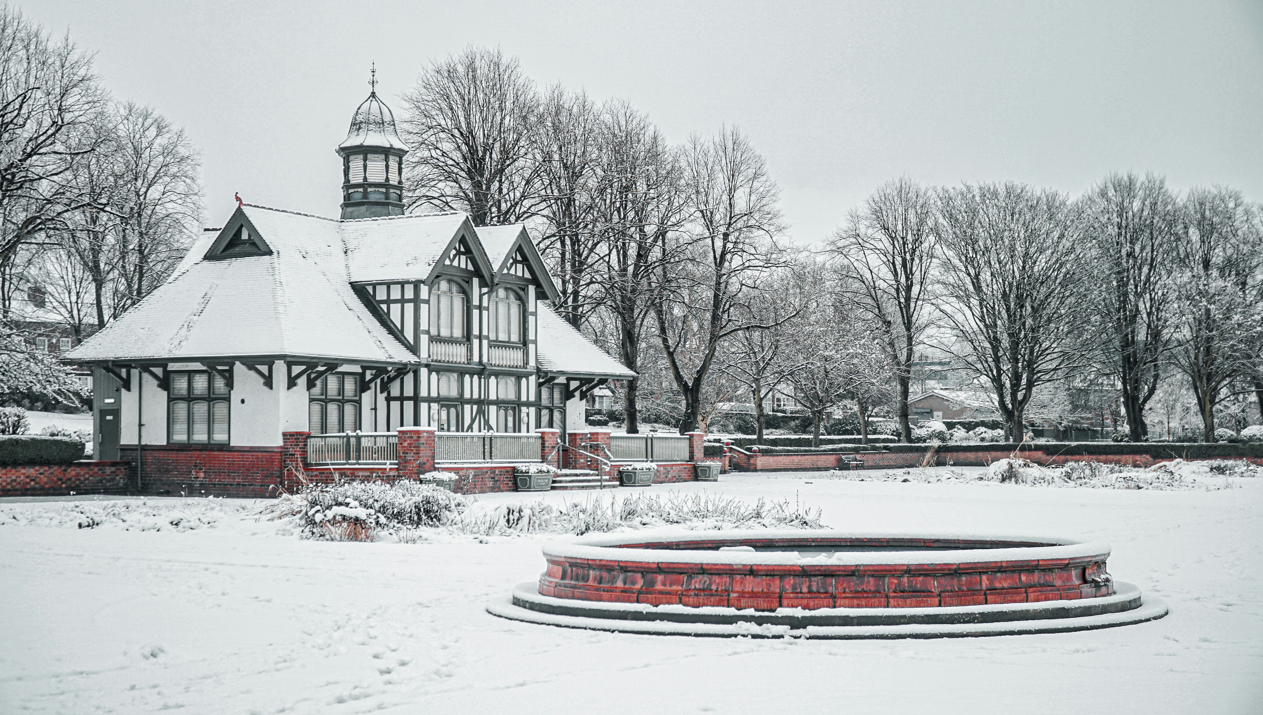 white and red house near trees during daytime, 