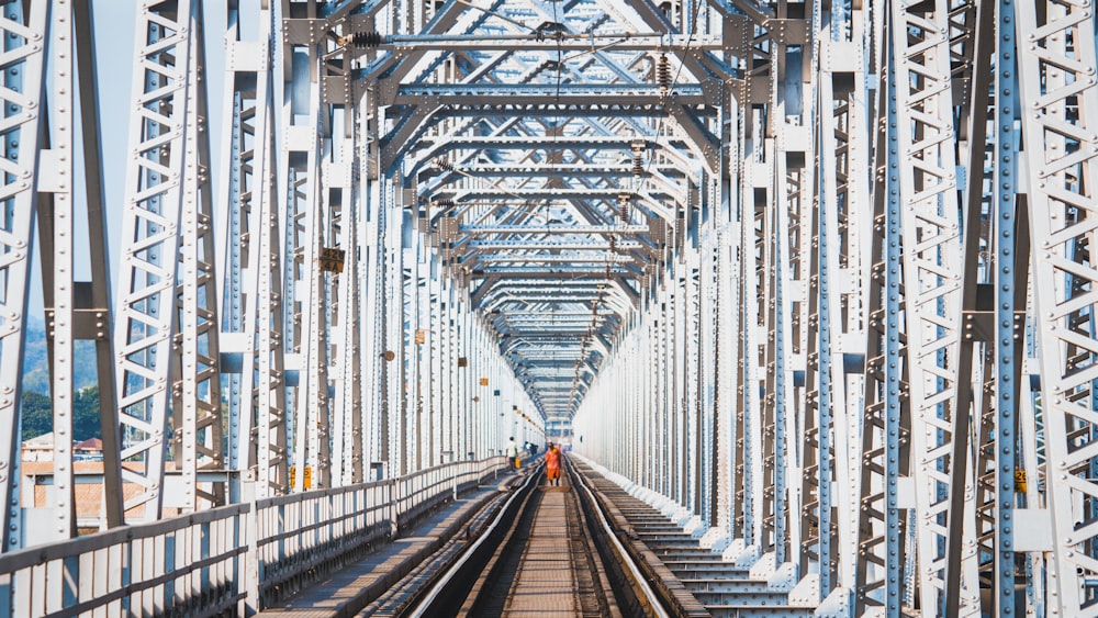white metal bridge during daytime