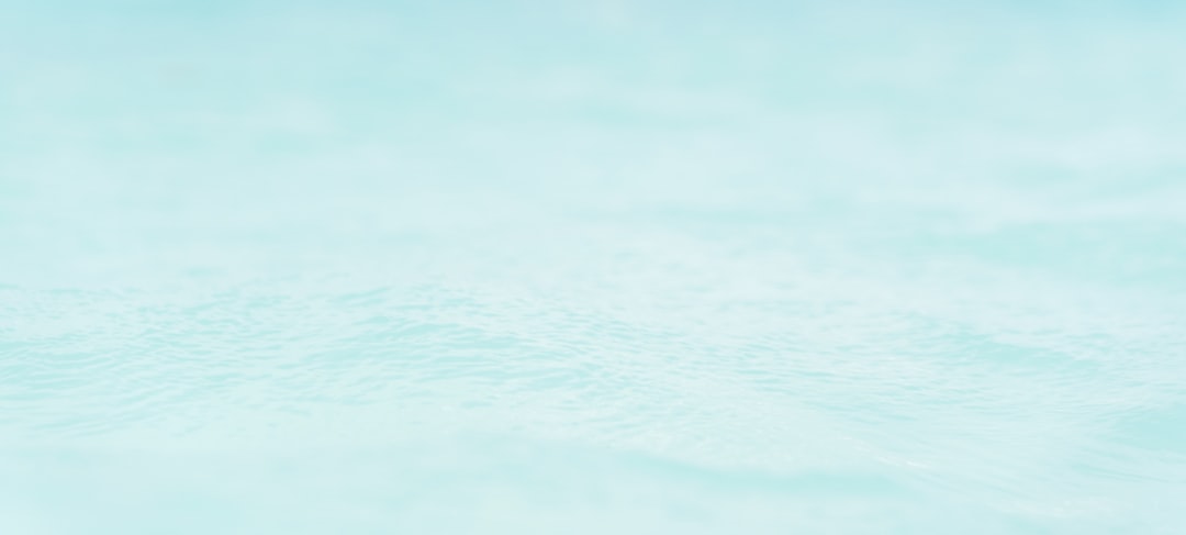 blue and white body of water,