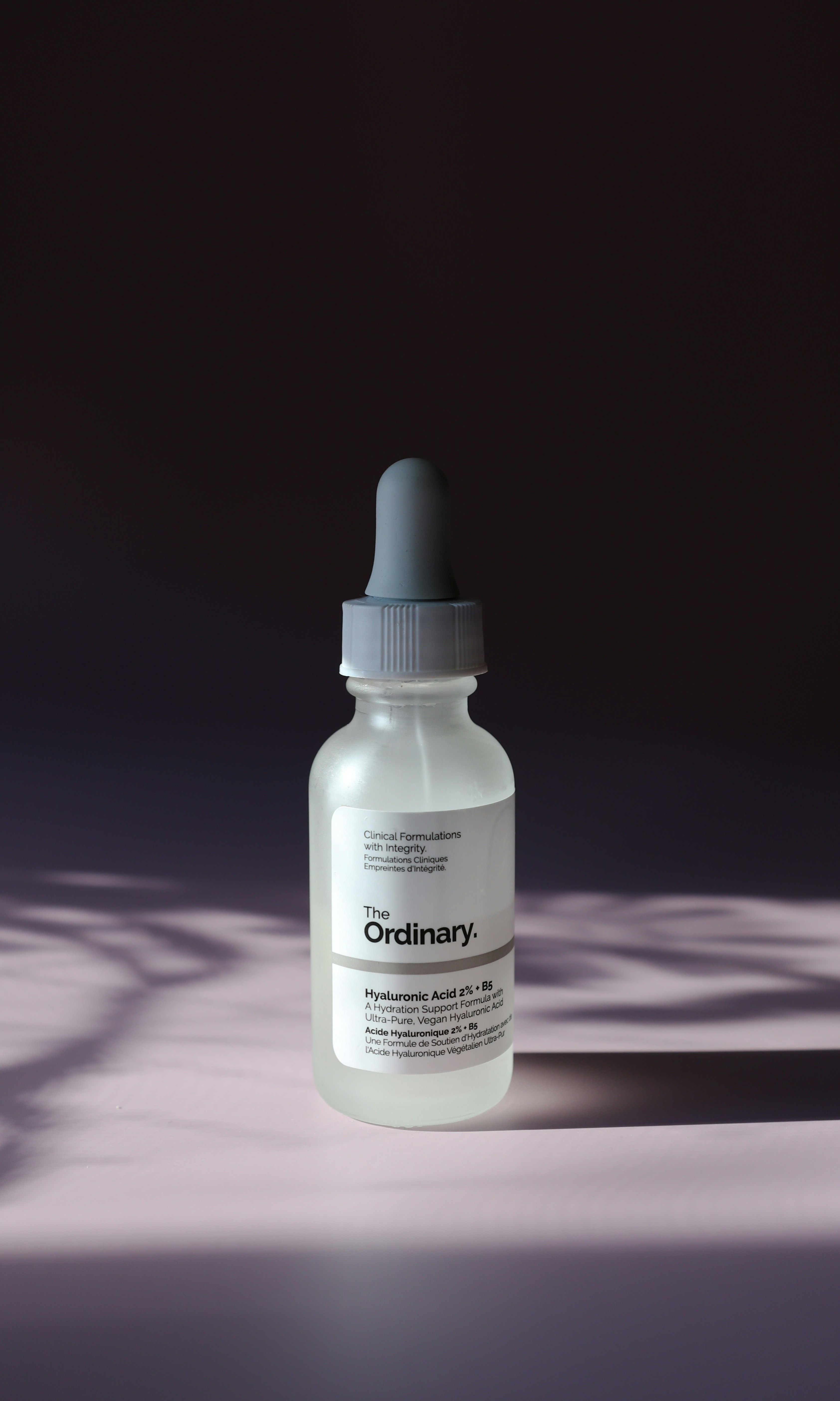 white and black labeled bottle