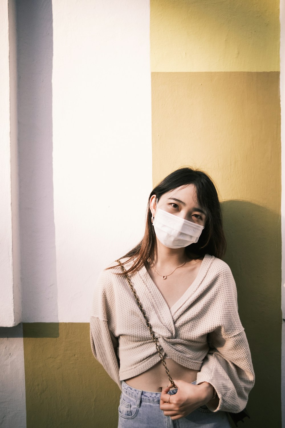 woman in white turtleneck sweater