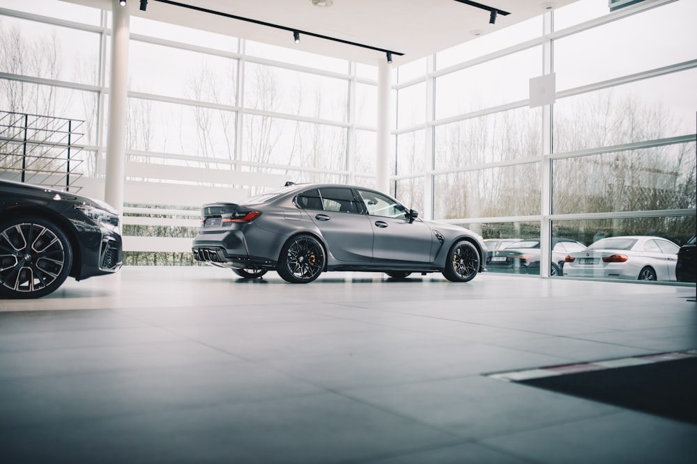 black coupe parked in a building