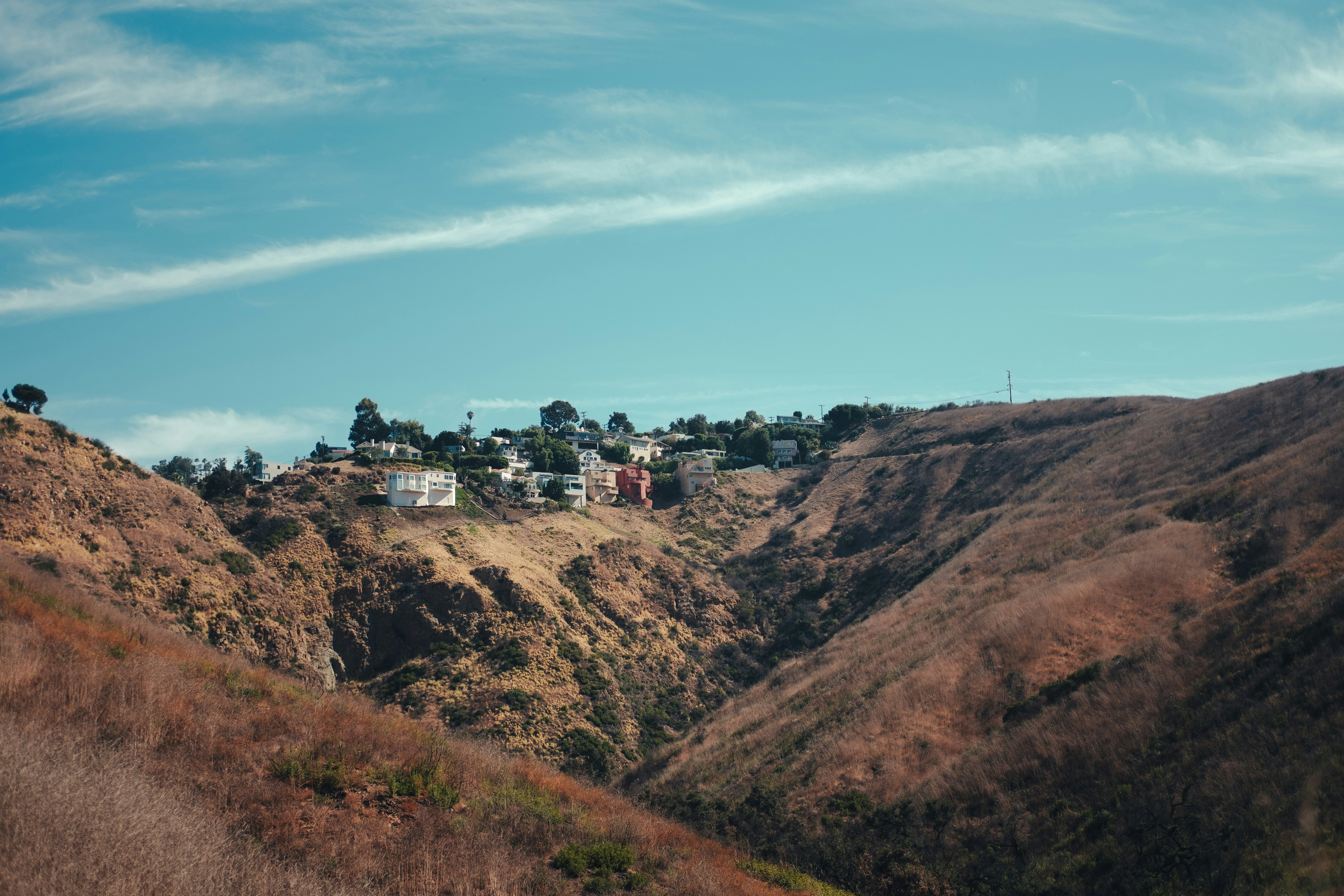 green and brown mountain under blue sky during daytime, 