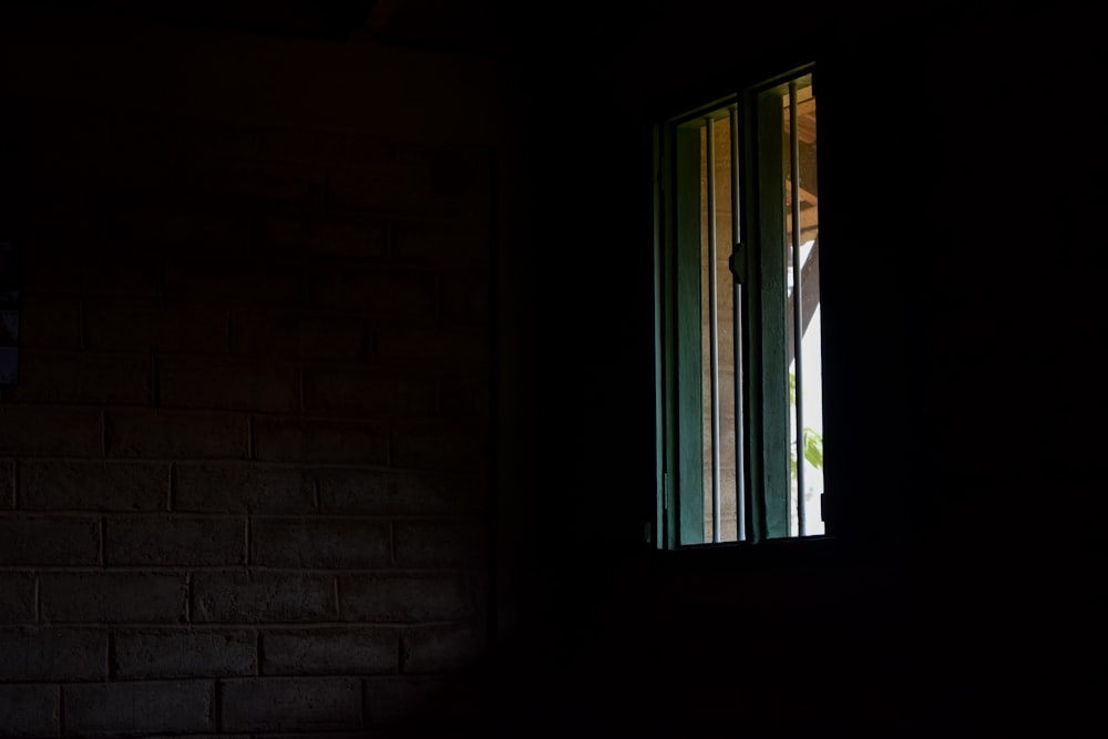 white wooden framed glass window