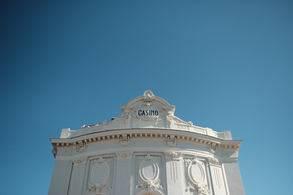 white concrete building under blue sky during daytime