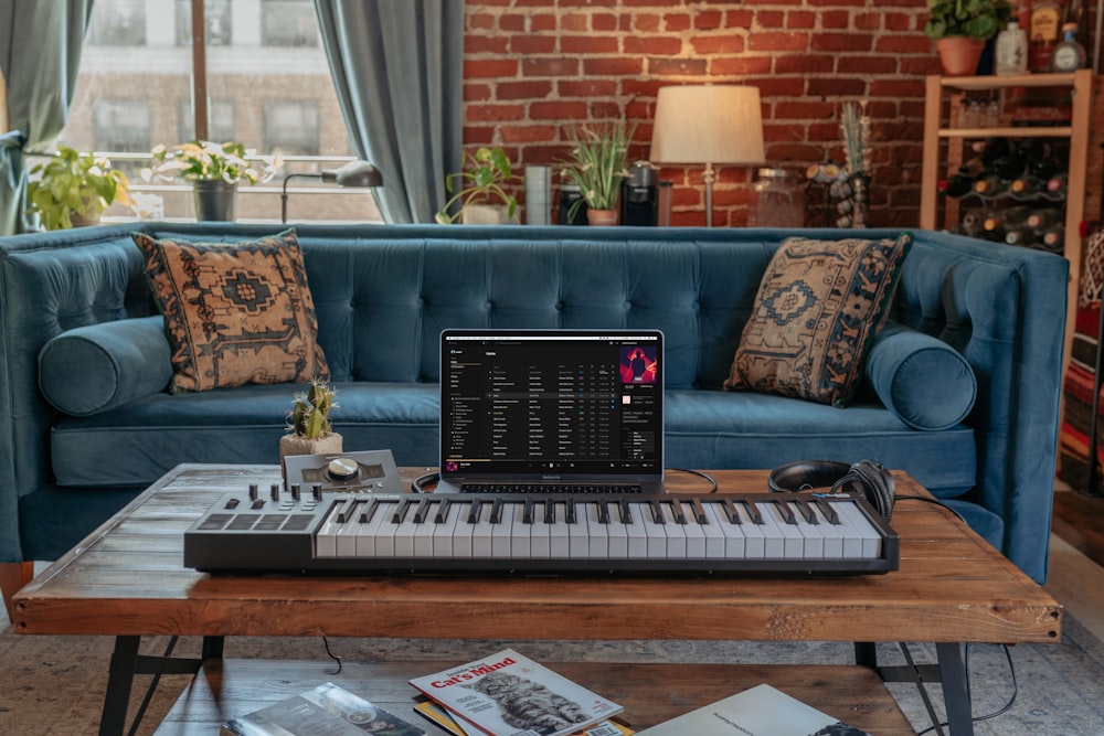 black laptop computer on table