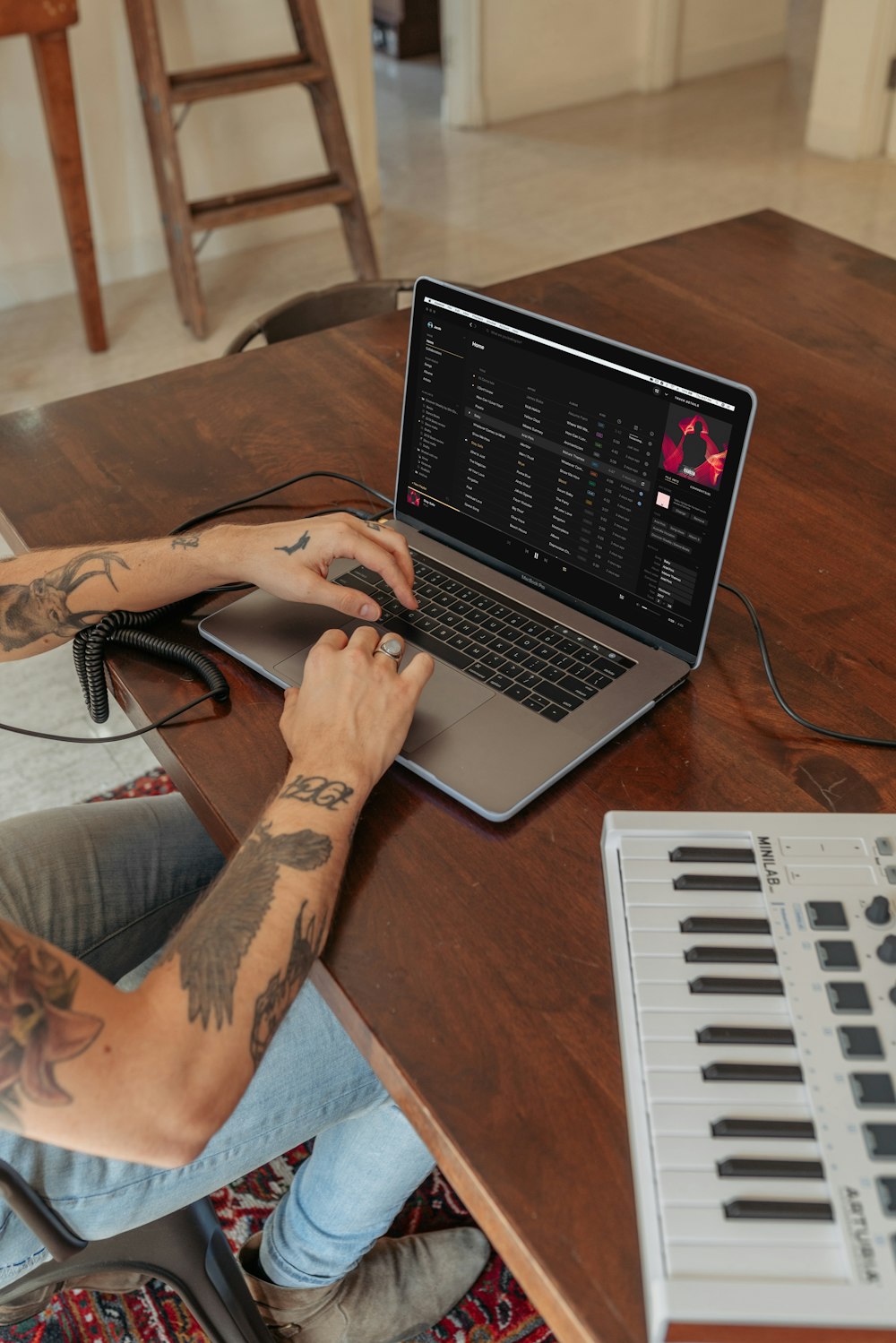 person using black and silver laptop computer