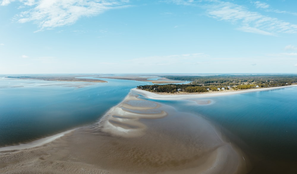 white sand beach during daytime