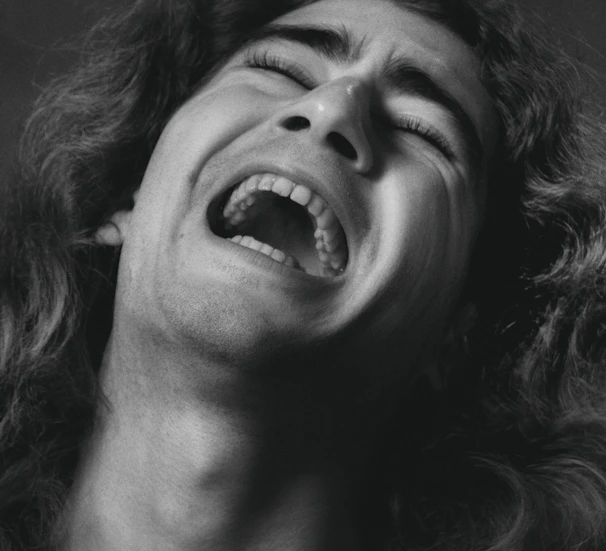 A powerful still from the documentary showing a key moment of emotional intensity.