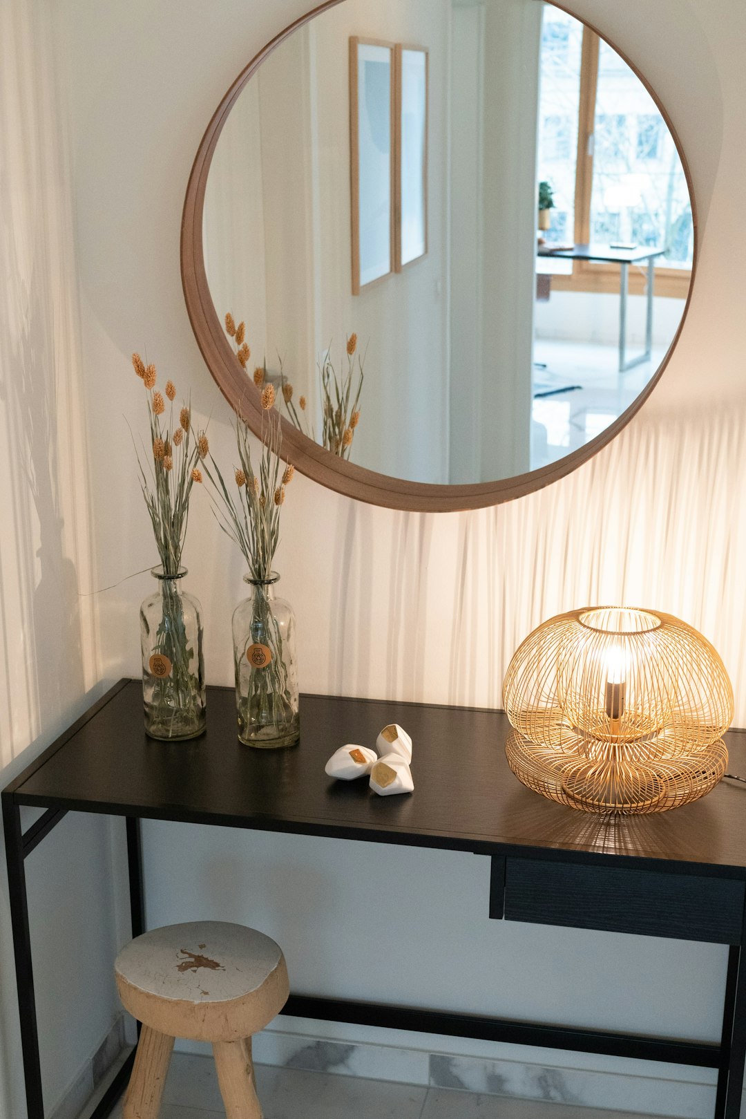 clear glass vase on black wooden table