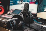 black and silver microphone on black computer keyboard