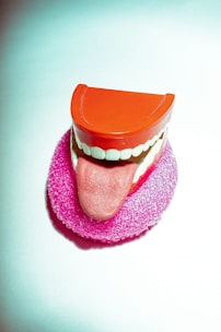 pink and white heart shaped cake