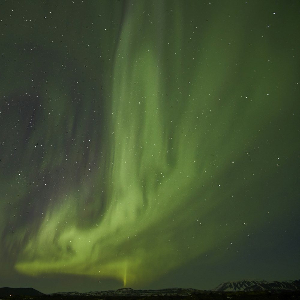 green and black sky during night time