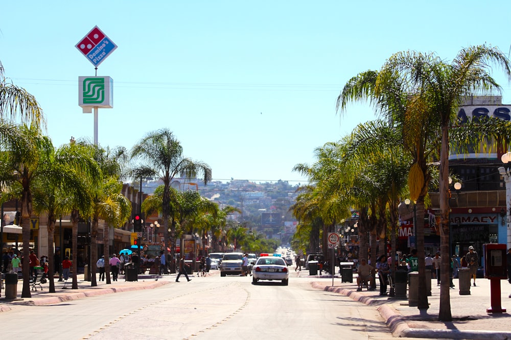 people walking on sidewalk during daytime