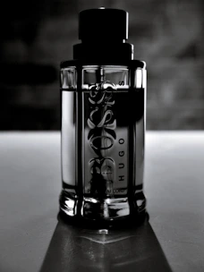 Sleek bottle of fernet with a subtle smoky neon effect and dark urban backdrop