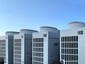 white concrete building under blue sky during daytime