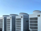 white concrete building under blue sky during daytime