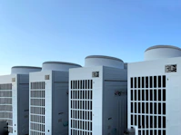 white concrete building under blue sky during daytime