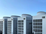 white concrete building under blue sky during daytime