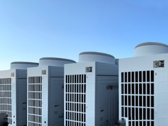 white concrete building under blue sky during daytime