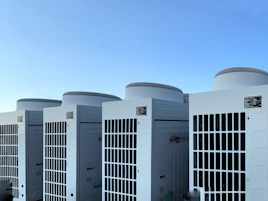 white concrete building under blue sky during daytime
