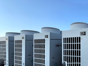 white concrete building under blue sky during daytime