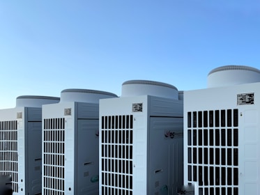 white concrete building under blue sky during daytime