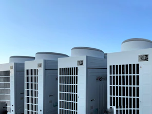 white concrete building under blue sky during daytime