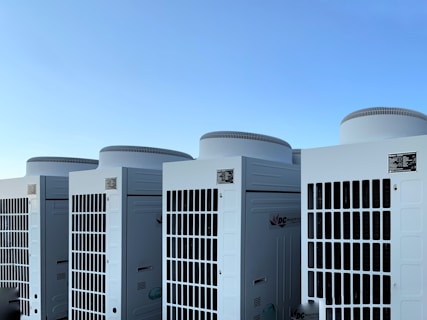 white concrete building under blue sky during daytime