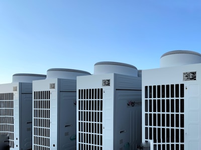 white concrete building under blue sky during daytime