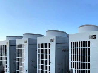 white concrete building under blue sky during daytime