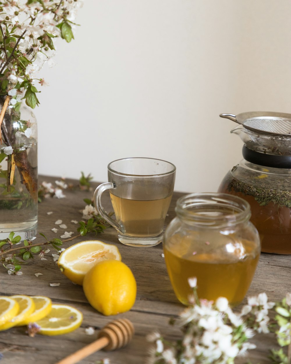 clear glass pitcher with lemon juice