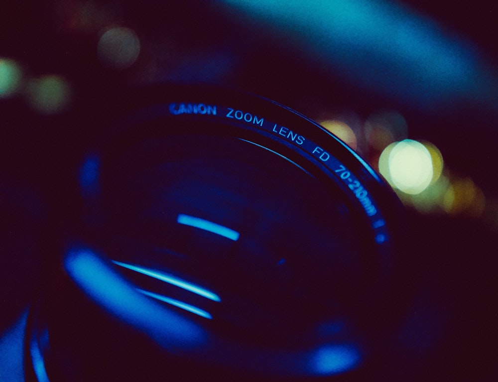 black canon camera lens cover