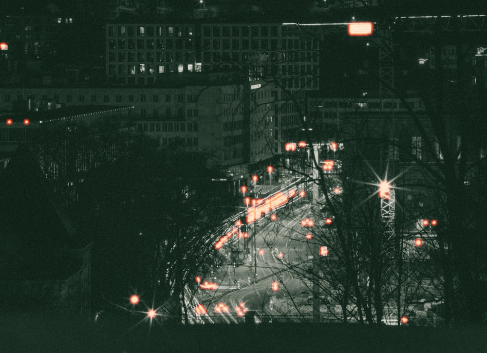 black and white city buildings during night time