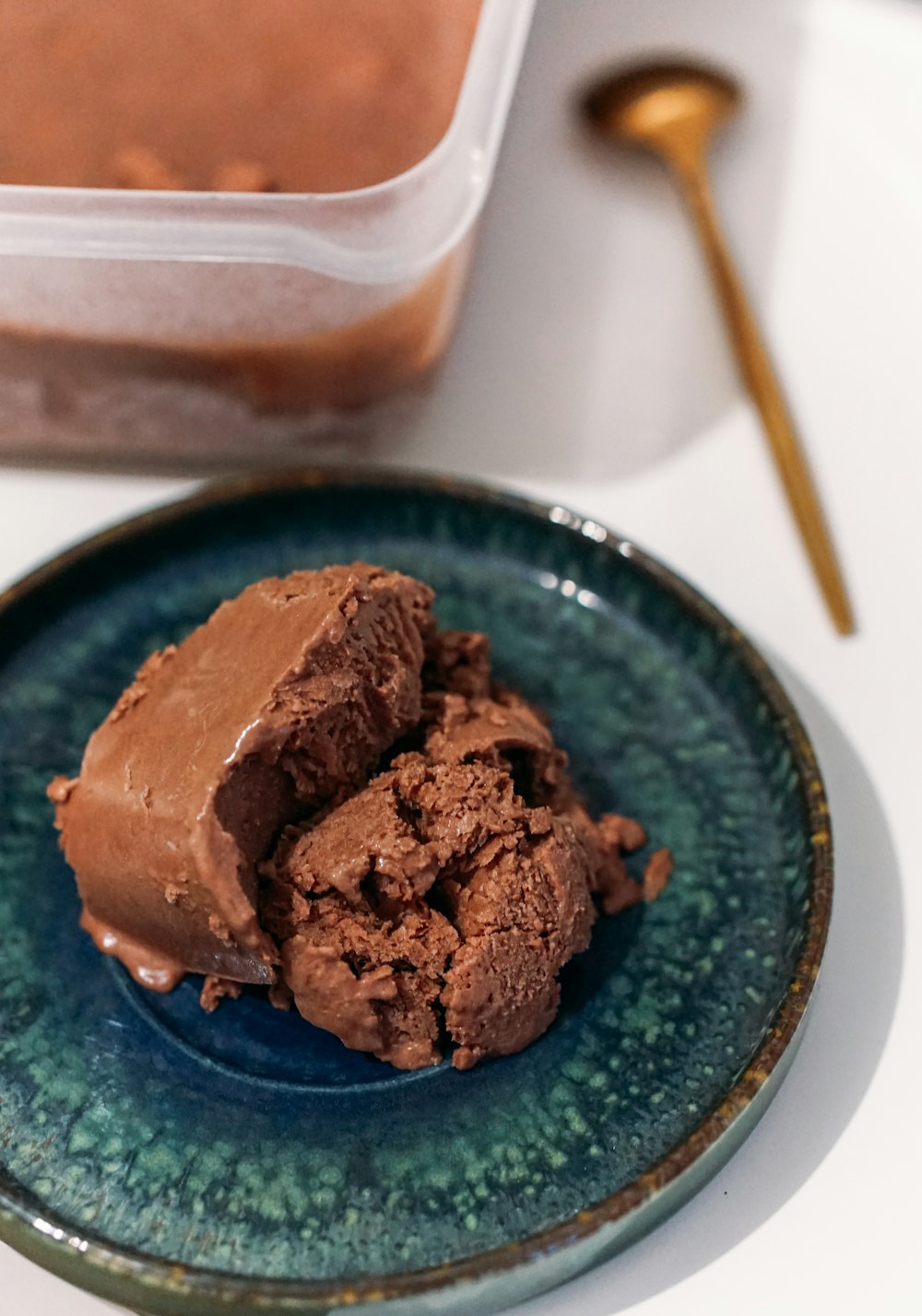 chocolate cake on blue ceramic plate