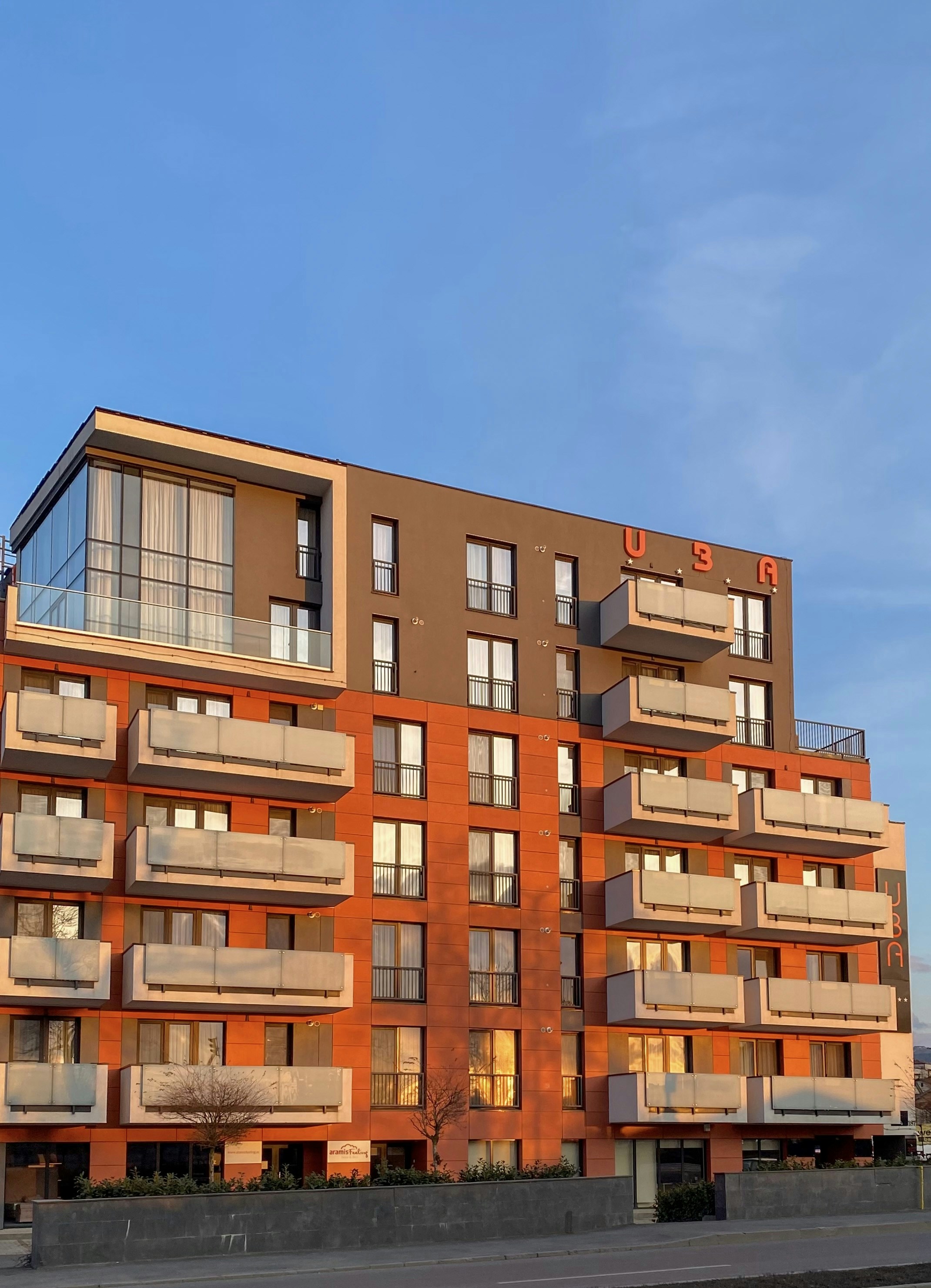 brown concrete building under blue sky during daytime