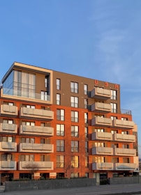 brown concrete building under blue sky during daytime