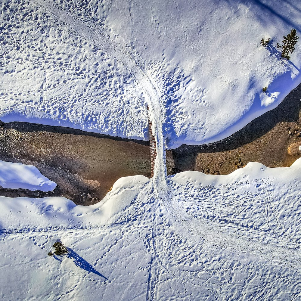 aerial view of snow covered field during daytime