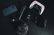 a black table topped with electronics and a microphone