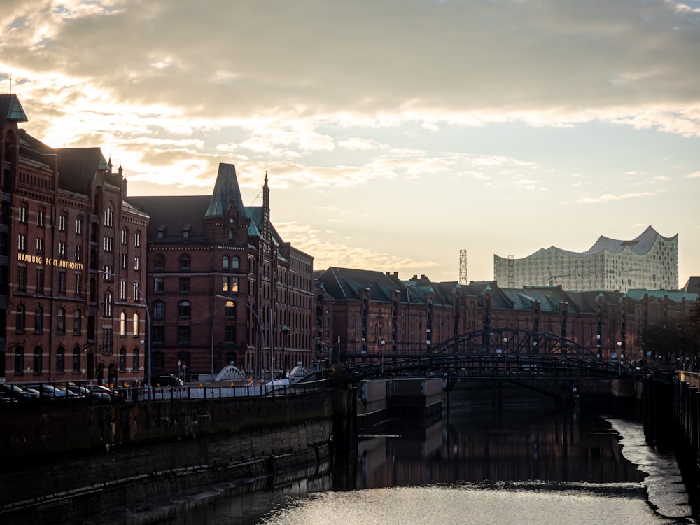 city buildings near body of water during daytime