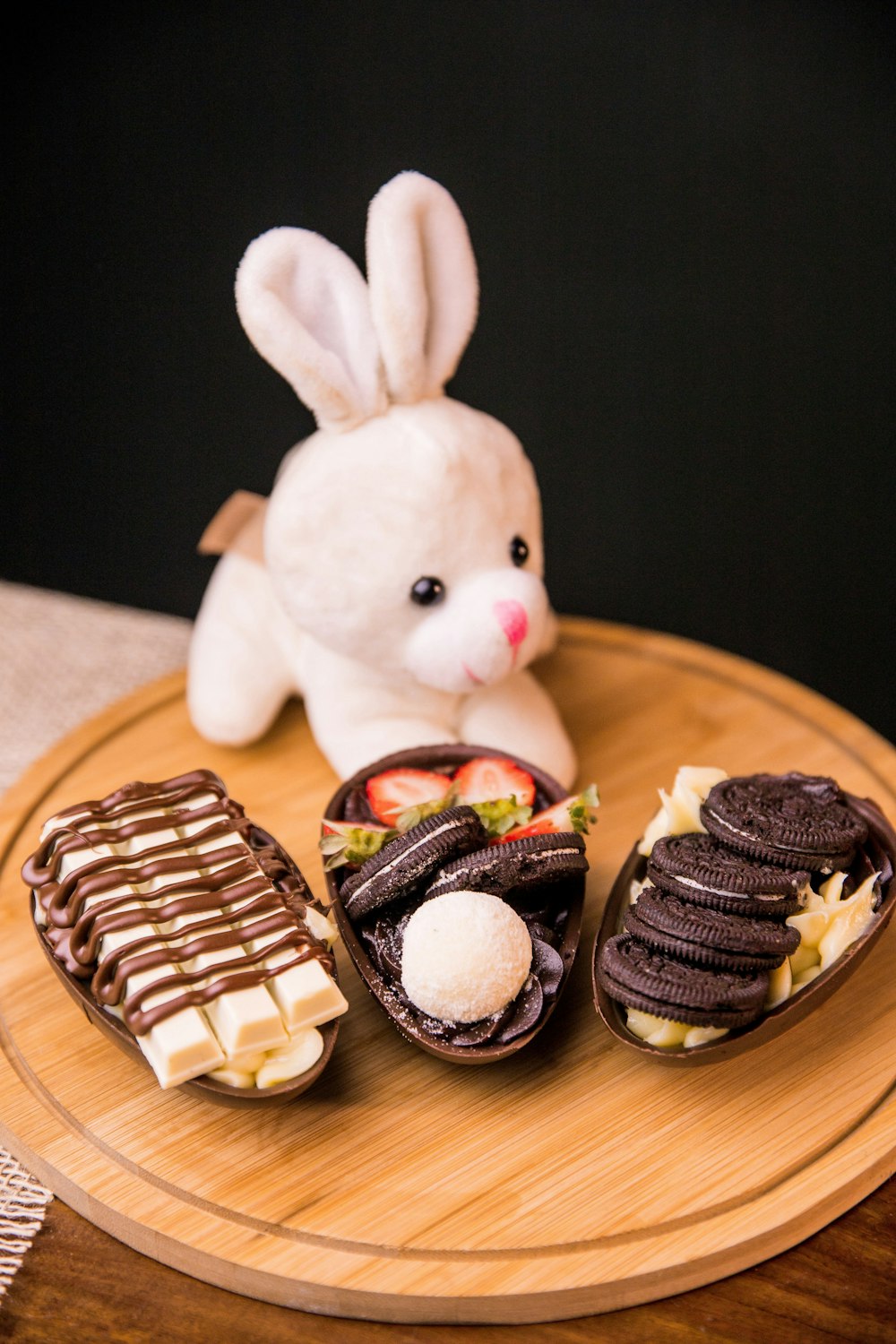 white rabbit plush toy on brown wooden table