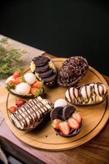 chocolate cupcakes on brown wooden tray