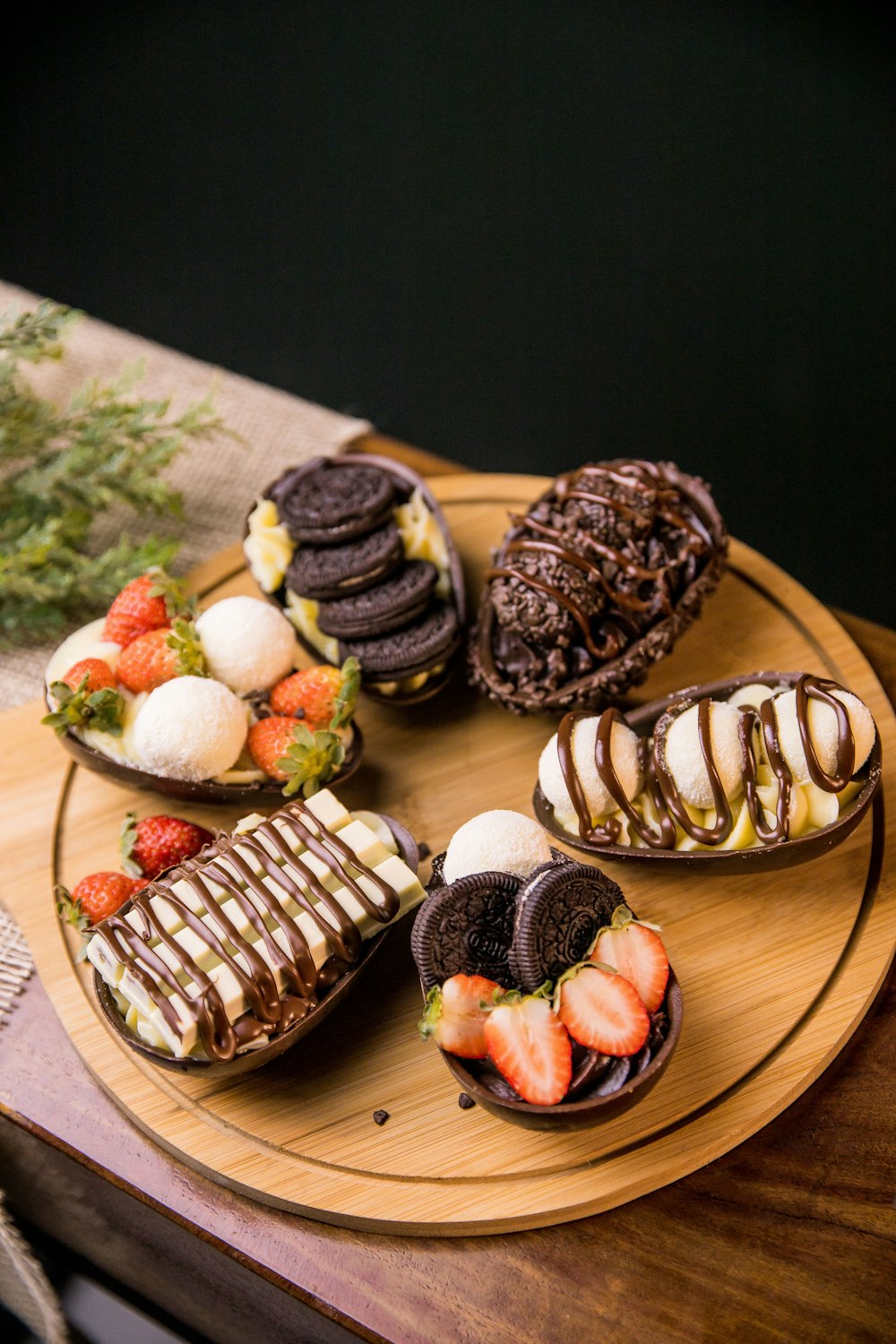 chocolate cupcakes on brown wooden tray