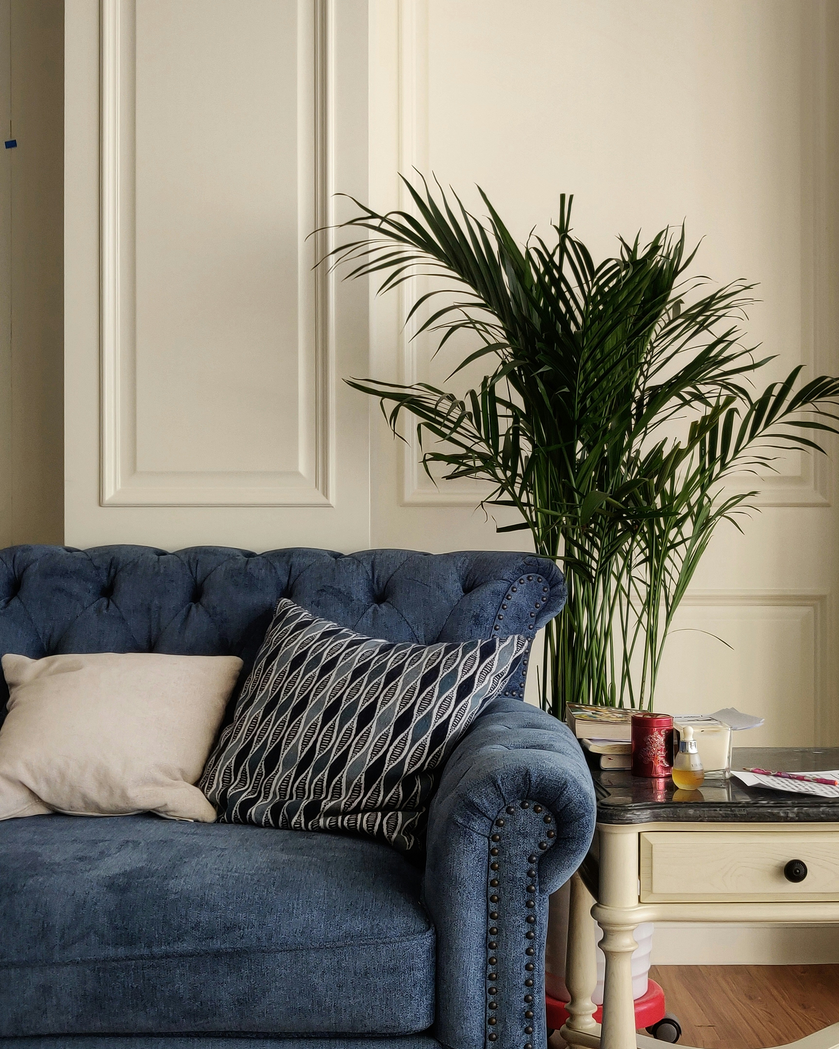 blue throw pillows on blue couch
