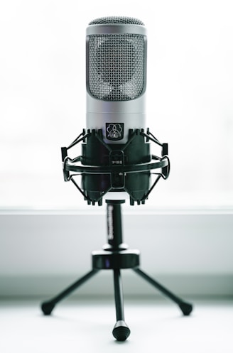 black and gray microphone with stand