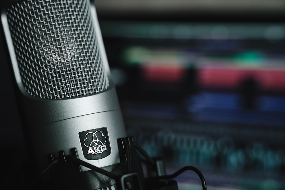 black and silver microphone on black stand